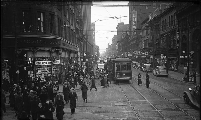 Traffic on Yonge Street looking north from south side of Queen Street. Friday December 20th 1935